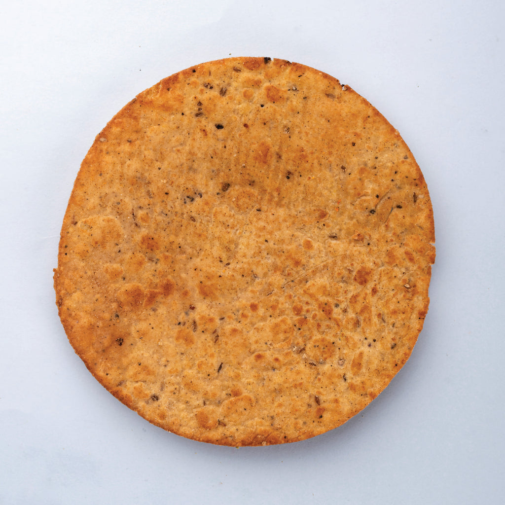 Garlic-flavoured khakhra by Heerson. Thin & crispy wheat snack.
